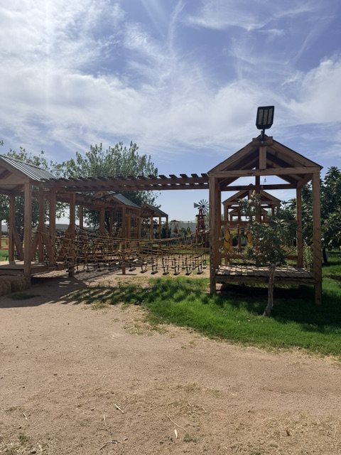 Rope bridges strung between wooden towers on the ropes course at Vertuccio Farms.